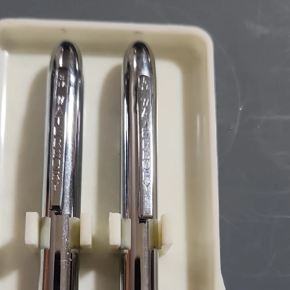 Elegant Silver and Patterned Pens Set